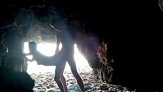 Couple recorded at the beach, inside the cave
