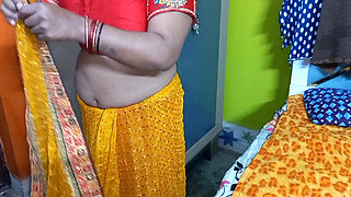 Beautiful Indian bhabhi having wearing a saree.