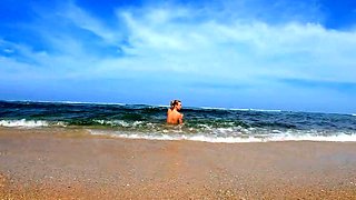 Blonde Babe's Naked Swim in the Ocean