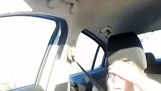 Car Sex With a Busty MILF Caught on Webcam