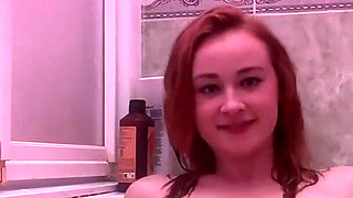 Redhead Play with Her Wet Pussy in Bathtub