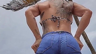 Giant Muscular Goddess on the Beach