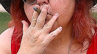 Nurse Vicki Smoking in the Park on a Bench All Dressed up