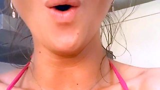 Brunette seductress working her big boobs and hot ass