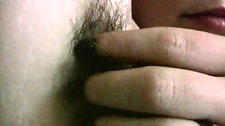 MILF Bianca Dagger with natural tits caresses herself in the kitchen