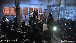 Strapped slave group caned in public