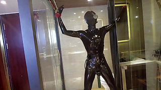Mz20 - the Girl in Latex Clothing Locked in a Glass Room