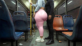 Balaclava BBW Gets Ass in Tight Shiny Pink Pants - Public Bus