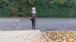 Naughty Granny Tongue Out Flashing Big Tits in Public