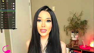 A super sexy brunette massages her big boobs