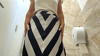 Mature MILF with Big Ass and Big Tits Masturbates in Public Toilet Until Orgasm