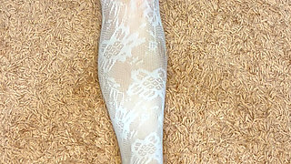 Rubbing my legs in stocking and thong and screwing around