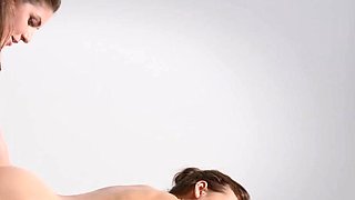 Sensual lesbian massage and fingering for lusty brunette