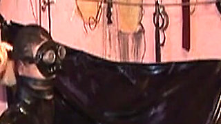 Latex Masters Dominate in Intense Rubber Bondage Play