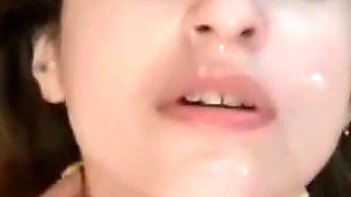 Double Cumshot with Facial and Swallowing a Lot of Milk From Two Big Cocks