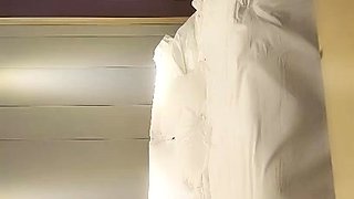 Cute amateur asian web cam girl playing with her toy