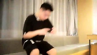 Cute amateur asian web cam girl playing with her toy