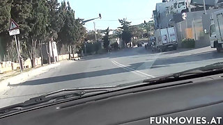MILF plays with cock in the car