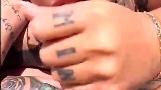 Tattooed british MILF pool blowjob