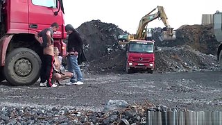 A cute blonde woman in a PUBLIC threesome at a construction site