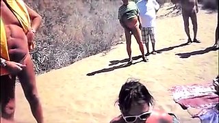 Nudist amateur wife delivers a nice blowjob on the beach