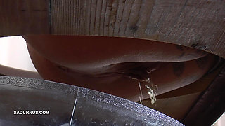 Mistress Cleo Squirts Toilet Water Into the Mouth of the Slave Lying in the Toilet Box