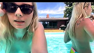 Blonde and brunette girlfriends having outdoor fun