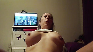 Blue-eyed blonde milf sucking and riding a nice cock