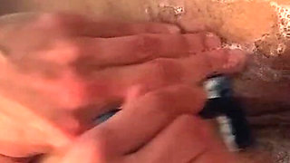 Neighbor wife showering and shaving her holes