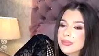 Brunette seductress working her big boobs and hot ass