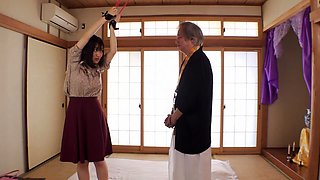 Young japanese girl worships old samurais dirty feet