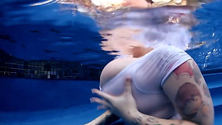 BBW babe shows off huge naturals in the pool underwater POV