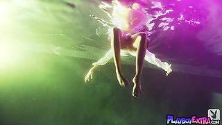 Young girl reveals her slit under the water