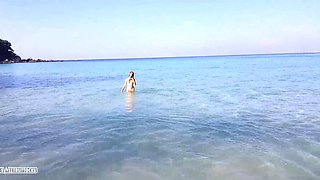 Sexy Russian girl nude on a public beach