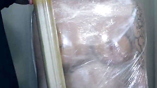 Gabriela in Mummification with Plastic Wrap, Whipping, Bastinado and Tickling