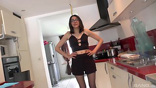 Brunette babe Celine De Bethune gets her mouth full of cum through a gloryhole