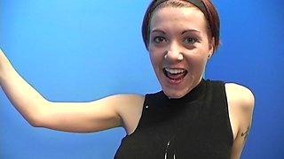 Redhead with short hair swallows a monster black cock