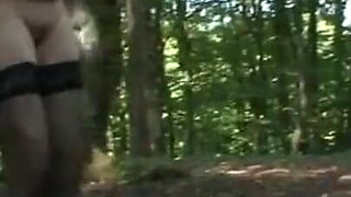 Humiliating whipping kneeling on the lake shore