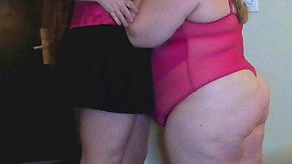 Tall Redhead and Short Blonde Getting Ready to Play