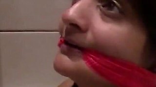 Busty Indian Bikini Babe Bound and Gagged in the Bathtub