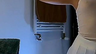 Cute and Hot Sexy Tight Pussy Cheerleader Shows Her Shaved and Wet Pussy Under Her Mini Skirt in the Bathroom