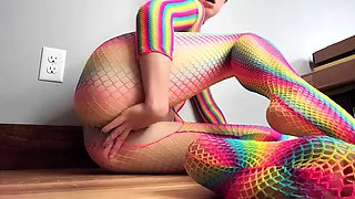 Teen in Rainbow Fishnets Fingers Herself