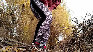 Russian milf with a gorgeous ass pissing in November outdoor