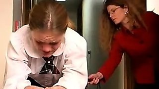 An amateur redhead lesbian is eating pussy from a brunette