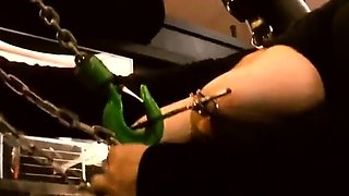 Slave M nipple stretching